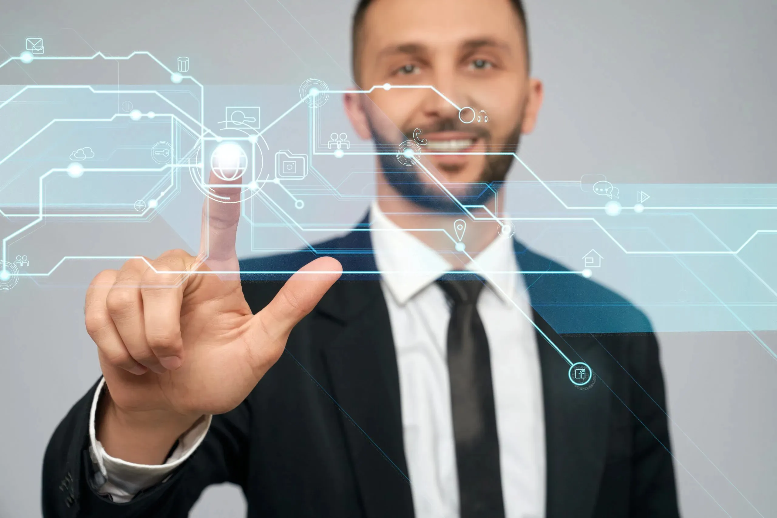 Businessman using Interactive Display Solutions with a virtual touchscreen interface